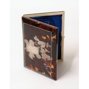 A Victorian tortoiseshell inlaid card case, the silver inlay…