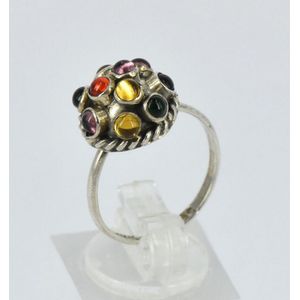 A Mexican dress ring, dome shaped with multi-colour stones…