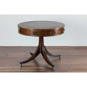 A mahogany drum table, with tooled leather top, English, 19th…