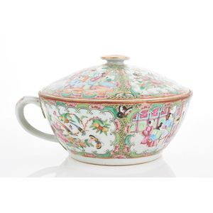 A large Cantonese famille-rose circular covered bowl with…