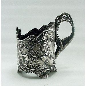 Russian silver tea glass holder, decorated all over in high…