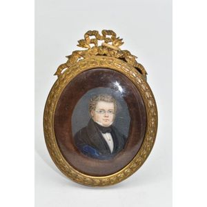 An antique portrait miniature hand painted on ivory depicting a…