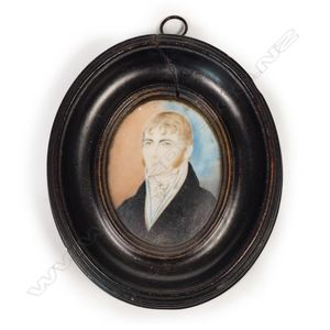 A Georgian hand painted portrait miniature, young man in formal…