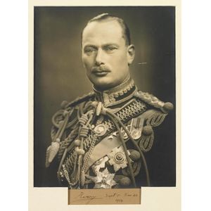 A collection of signed British royal photographs including…