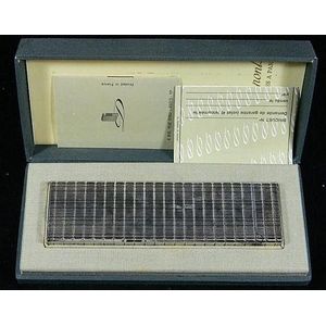 A cased silver metal table cigarette lighter, marked Dupont