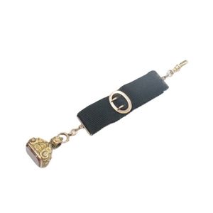 Victorian gold & gold cased lapel fob seal marked 10c P&R to&hellip;