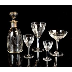 An Art Deco 40 piece cut crystal decanter and bar glassware set,…