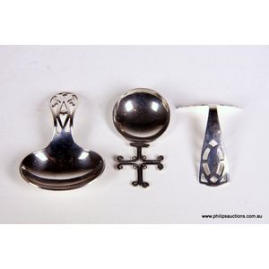 Two sterling silver caddy/baby spoons and a sterling silver…