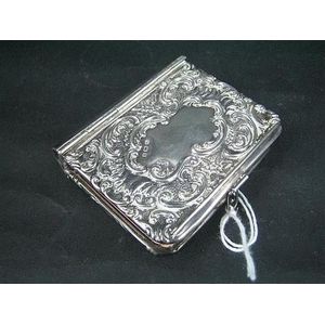 An Edwardian silver-mounted miniature prayer book; Crisford &…