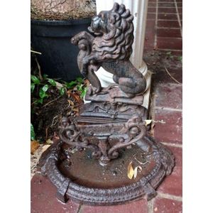 Antique cast iron foot scraper & door stop in the form of a…