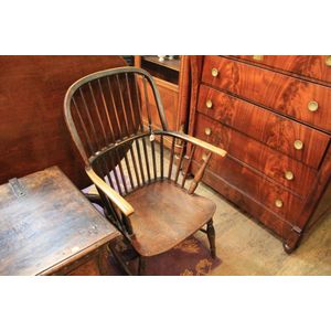 An English yew and elm cone back Windsor chair.