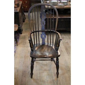 An English 18th century oak and elm Windsor chair.