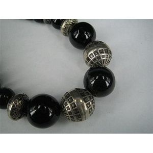 An onyx graduated bead and silver bead necklace with bar and…