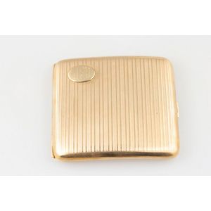 George V 9ct cigarette case, slightly bowed form with engine…