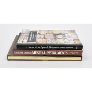 Three reference books on Guitars and musical Instruments, a…