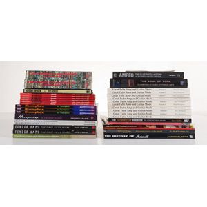 A collection of reference books on Amplifiers, including fender…