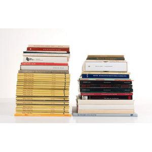 A collection of various exhibition catalogues and multiple…