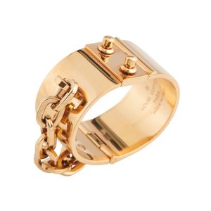 Louis Vuitton Goldtone Metal Lock Me Manchette Cuff Bracelet