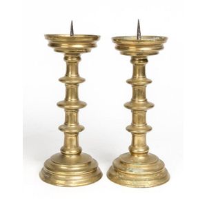 A pair of brass ecclesiastical candlesticks, 18th century, 34…