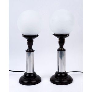 A pair of Art Deco table lamps and shades, Bakelite, chrome and…