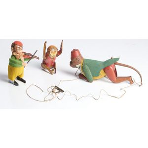 Three clockwork tinplate monkey toys, early 20th century,…