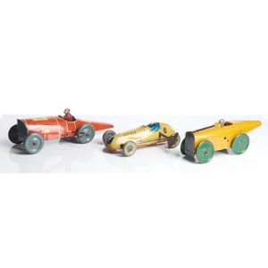 Three tinplate clockwork toy Open-Wheel race cars, early 20th…
