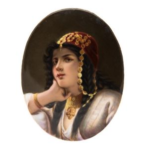 A miniature portrait of a gypsy girl painted on porcelain,…