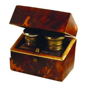 A small 19th century tortoiseshell box containing two small…