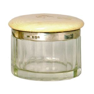 An ivory and silver topped dressing table jar. London 1924.…