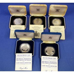 Five United Kingdom commemorative silver coins, to include 2…