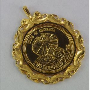 Australian 1989 $200 gold coin, in 9ct gold surround, total…