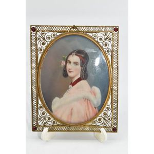 An exquisite antique portrait miniature of a young lady with…