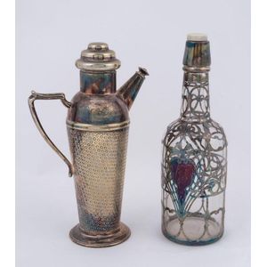 A silver overlay glass whisky decanter and a silver plated Art…