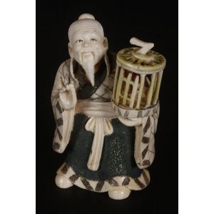Sold at Auction: A Japanese Meiji era carving of a sumo wrestler (H:16cm)