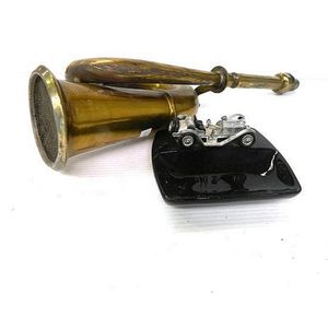A brass car horn, together with Lesney car mascot ashtray