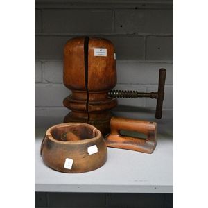 Three antique French turned wood hat stretchers, 29 cm high (3)
