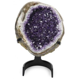 Amethyst Crystal: Large geode containing a mass of deep violet…