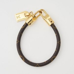 AUTHENTIC Louis Vuitton Gold Charm Plate Monogram Charm Bracelet