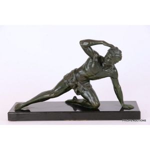An Art Deco spelter figure by Jean de Roncourt, Jean de…