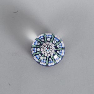 A Murano millefiori paperweight, height 4.5 cm, depth 6.5 cm