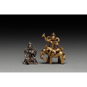 Two Tibetan bronze seated figures including a gilt bronze&hellip;