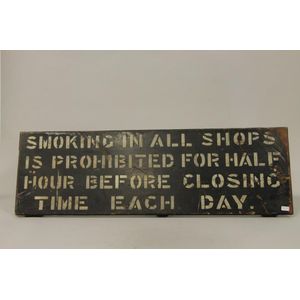 A wooden New Zealand Railways 'No Smoking' sign stating…