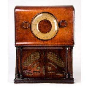 Astor Mickey baby grand, curved timber cased upright mantle…