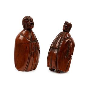 A pair of rare colonial carved coquilla nut figural snuff boxes,…