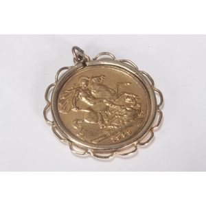 Gold sovereign, c.1959, with gold surround, total weight 9.82gm