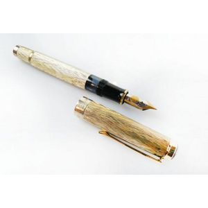 A classic fountain pen by Pelikan having a patterned sterling…