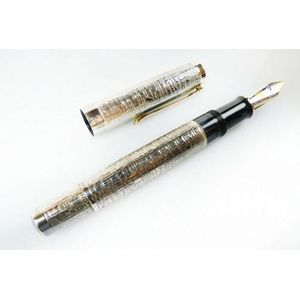 A classic fountain pen by Pelikan having a patterned sterling…