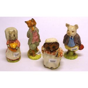 Four various Beswick Beatrix Potter figurines including Foxy…