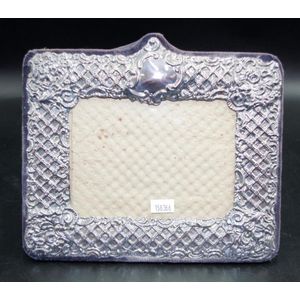 Elizabeth II sterling silver photo frame London 1989, embossed…