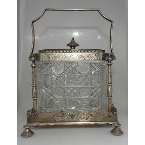 An impressive silver plated cut crystal biscuit casket. 15 cm…